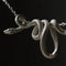 Collier Serpent Enroulé sur la Chaîne Argenté