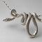 Collier Serpent Enroulé sur la Chaîne Argenté