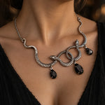 Collier Serpents Enlacés à Gouttes de Cristal - Vignette | Médiéfan
