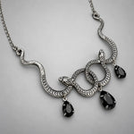 Collier Serpents Enlacés à Gouttes de Cristal - Vignette | Médiéfan