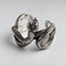 Bague Serpent Entrelacé sur fond clair