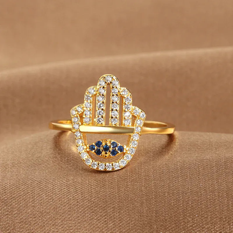 Bague Main de Fatima Ajourée Sertie d'Œil Bleu Doré