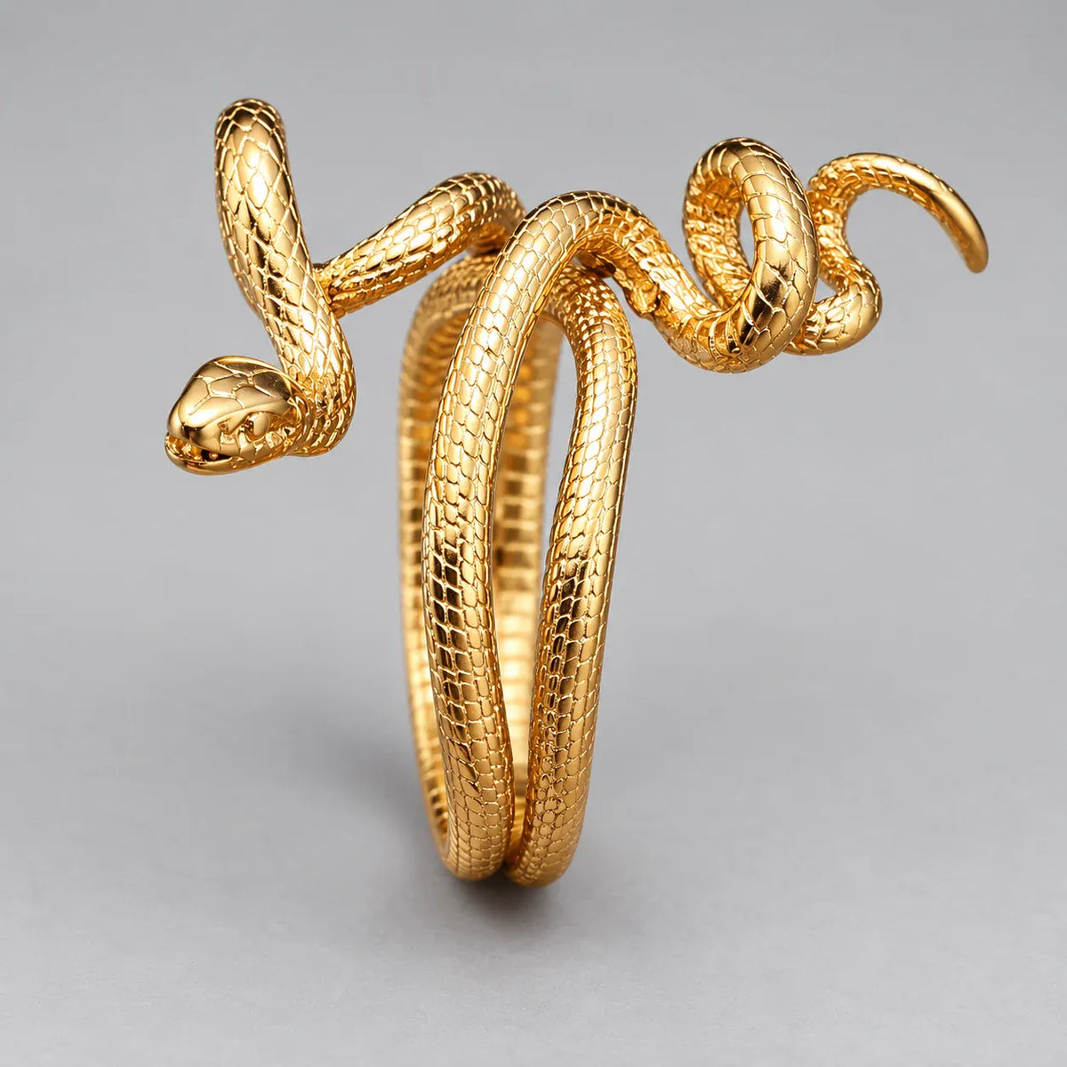 Bague Serpent Enroulé en Triple Tour Doré / 12