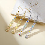 Boucles d'Oreilles Longues Symboles des 7 Chakras - Vignette | Médiéfan