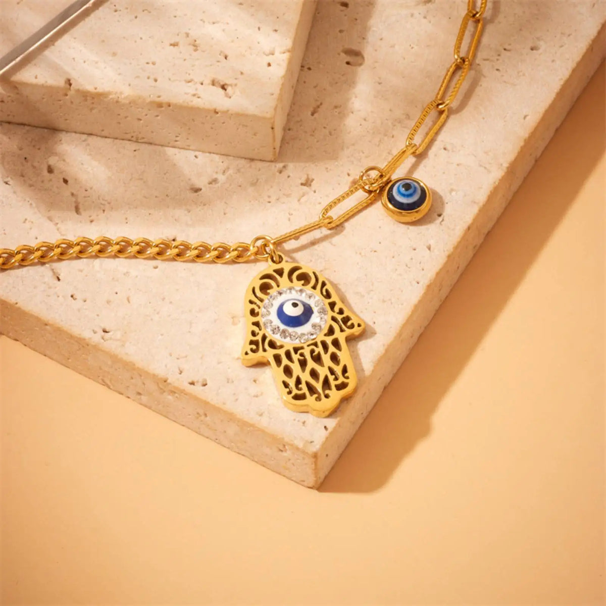 Bracelet Doré Main de Fatima et Breloque Œil Bleu Doré