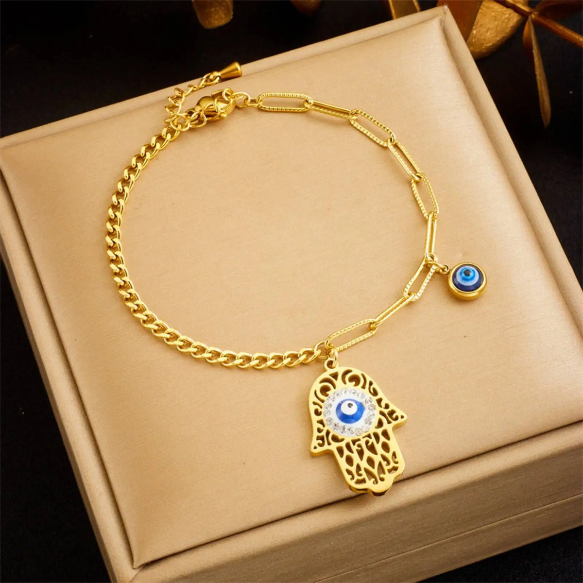 Bracelet Doré Main de Fatima et Breloque Œil Bleu Doré