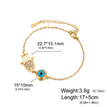 Bracelet Main de Fatima Filigranée et Cabochon Bleu - Vignette | Médiéfan