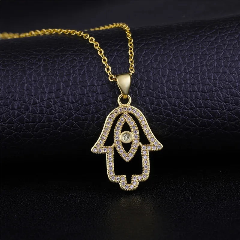 Collier Main de Fatima Ajourée Pavée à Œil Doré