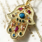 Collier Main de Fatima Dorée Sertie de Pierres Multicolores - Vignette | Médiéfan