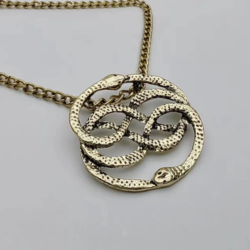 Collier Médaillon aux Serpents Entrelacés Bronze vieilli