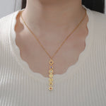 Collier Pendentif Vertical aux 7 Symboles des Chakras - Vignette | Médiéfan