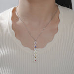 Collier Pendentif Vertical aux 7 Symboles des Chakras - Vignette | Médiéfan