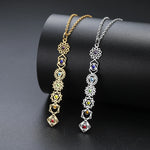 Collier Pendentif Vertical aux 7 Symboles des Chakras - Vignette | Médiéfan