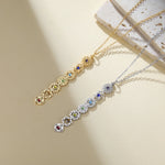 Collier Pendentif Vertical aux 7 Symboles des Chakras - Vignette | Médiéfan
