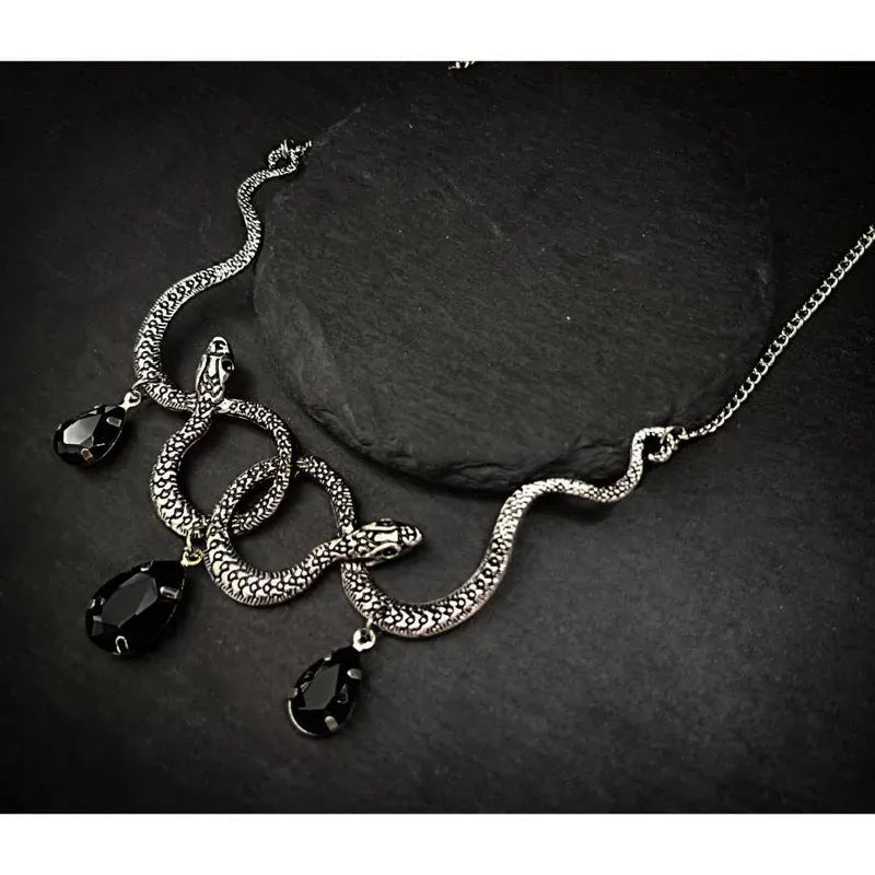 Collier Serpents Enlacés à Gouttes de Cristal