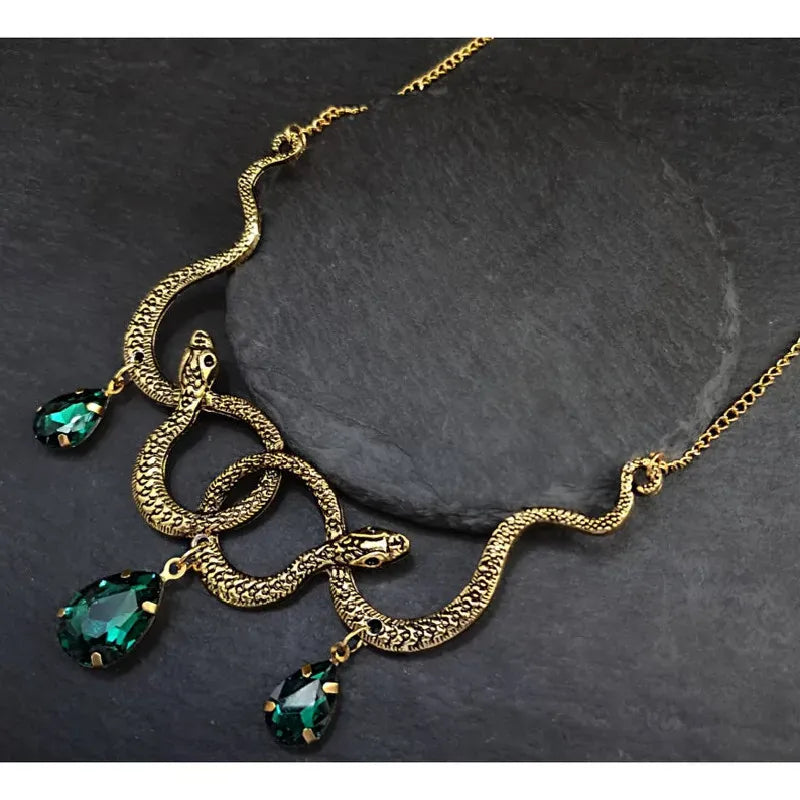 Collier Serpents Enlacés à Gouttes de Cristal