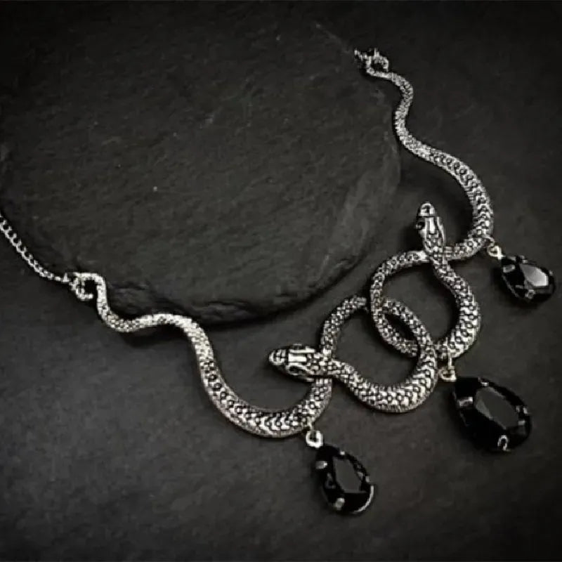 Collier Serpents Enlacés à Gouttes de Cristal Argenté & noir / 70 cm