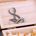 Créoles Serpent Infini - Vignette | Médiéfan