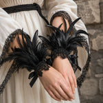 Manchette de poignet en plumes noires - Vignette | Médiéfan