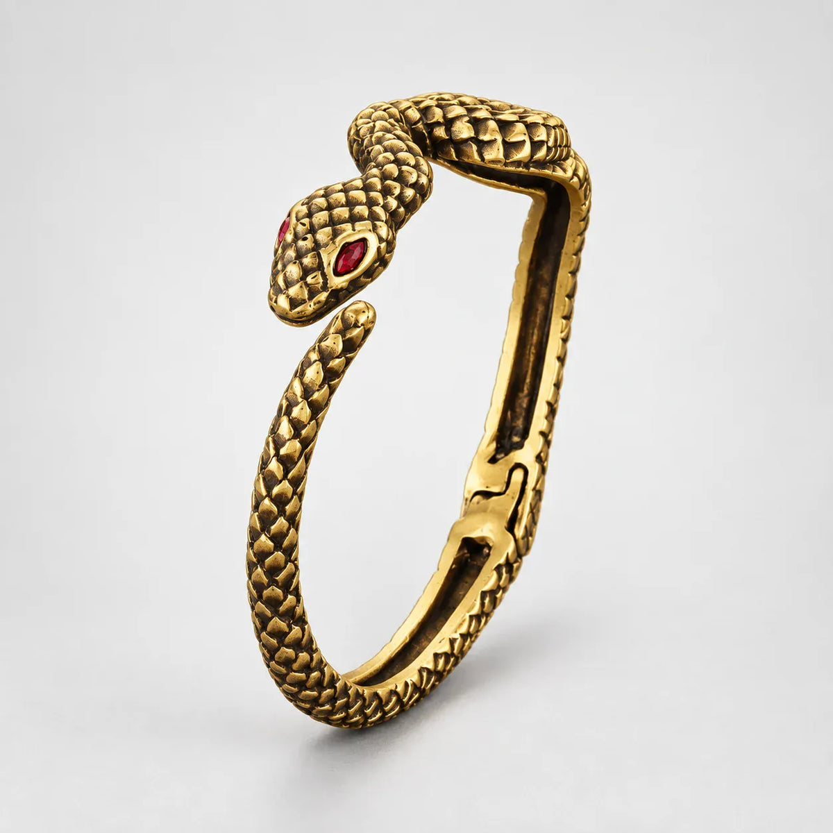 Manchette Serpent aux Yeux Rouges Doré
