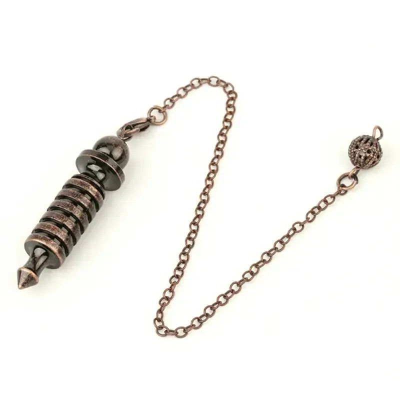 Pendule Isis en Métal Cuivre antique · anneaux